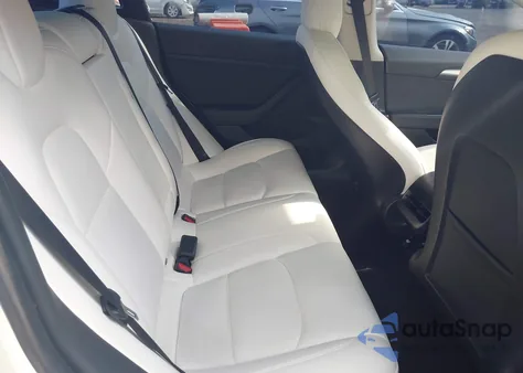 2021 Tesla Model 3 Standard Range Plus Rear-Wheel Drive z USA, uszkodzony, nr VIN 5YJ3E1EA7MF059222